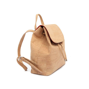 Natural cork backpack for women with drawstring and folding top closure, side view