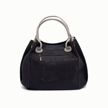 Load image into Gallery viewer, black and grey cork handbag with cut outs, back view