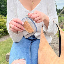 Load image into Gallery viewer, Model holding a grey and natural cork wallet for women with coin pocket