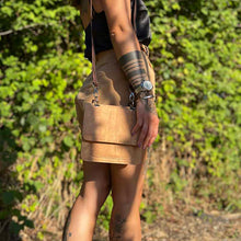 Load image into Gallery viewer, Mini cork top handle bag being worn as a crossbody bag