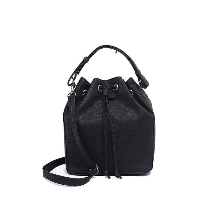 Classic black cork bucket bag with removable handle and adjustable and removable crossbody strap