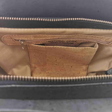 Load image into Gallery viewer, Natural and black cork fabric handbag with Portuguese tile cut-outs, inside view with phone compartment
