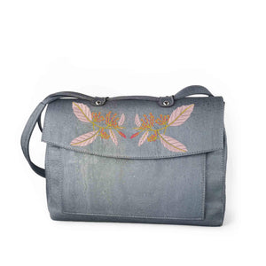 Silver blue cork fabric satchel bag with floral embroidery, front view