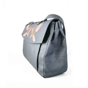 Silver blue cork fabric satchel bag with floral embroidery, side view