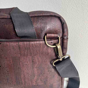 Brown cork laptop bag, hardware detail close-up