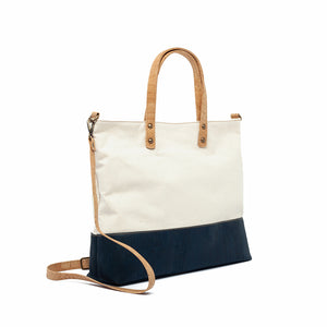Navy-blue cork and canvas tote bag with natural cork handles and strap side view