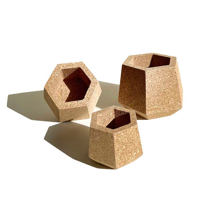 Cork planters in three different sizes on a white background