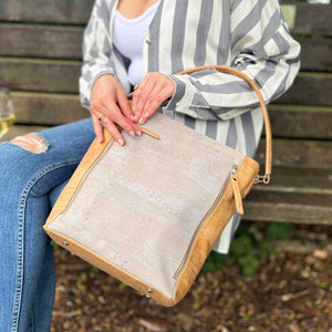 Model opens a natural and grey cork tote handbag