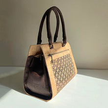 Load image into Gallery viewer, Natural and brown cork fabric handbag with Portuguese tile cut-outs in the sun, side view