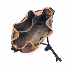 Load image into Gallery viewer, Natural and brown tinted cork fabric bucket bag with drawstring, view from top, open