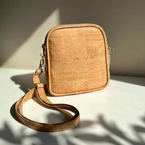 Small natural cork crossbody purse for woman in natural light