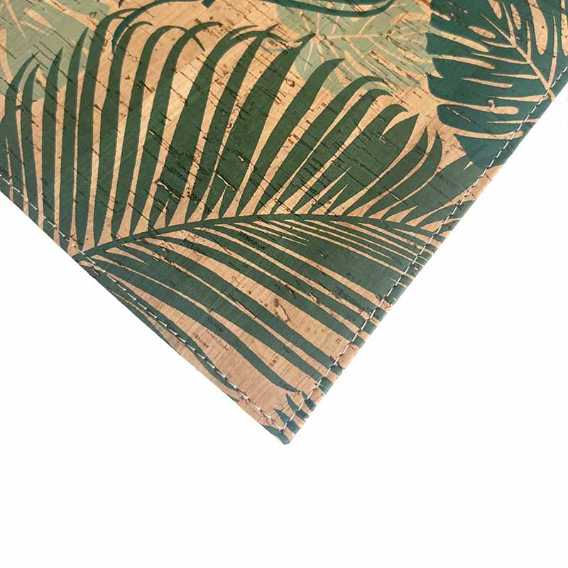 Natural cork placemats with green leaves