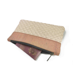 Cork and woven straw fabric purse with zipper, open with passport inside