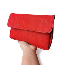 Load image into Gallery viewer, Red cork clutch crossbody bag on a hand